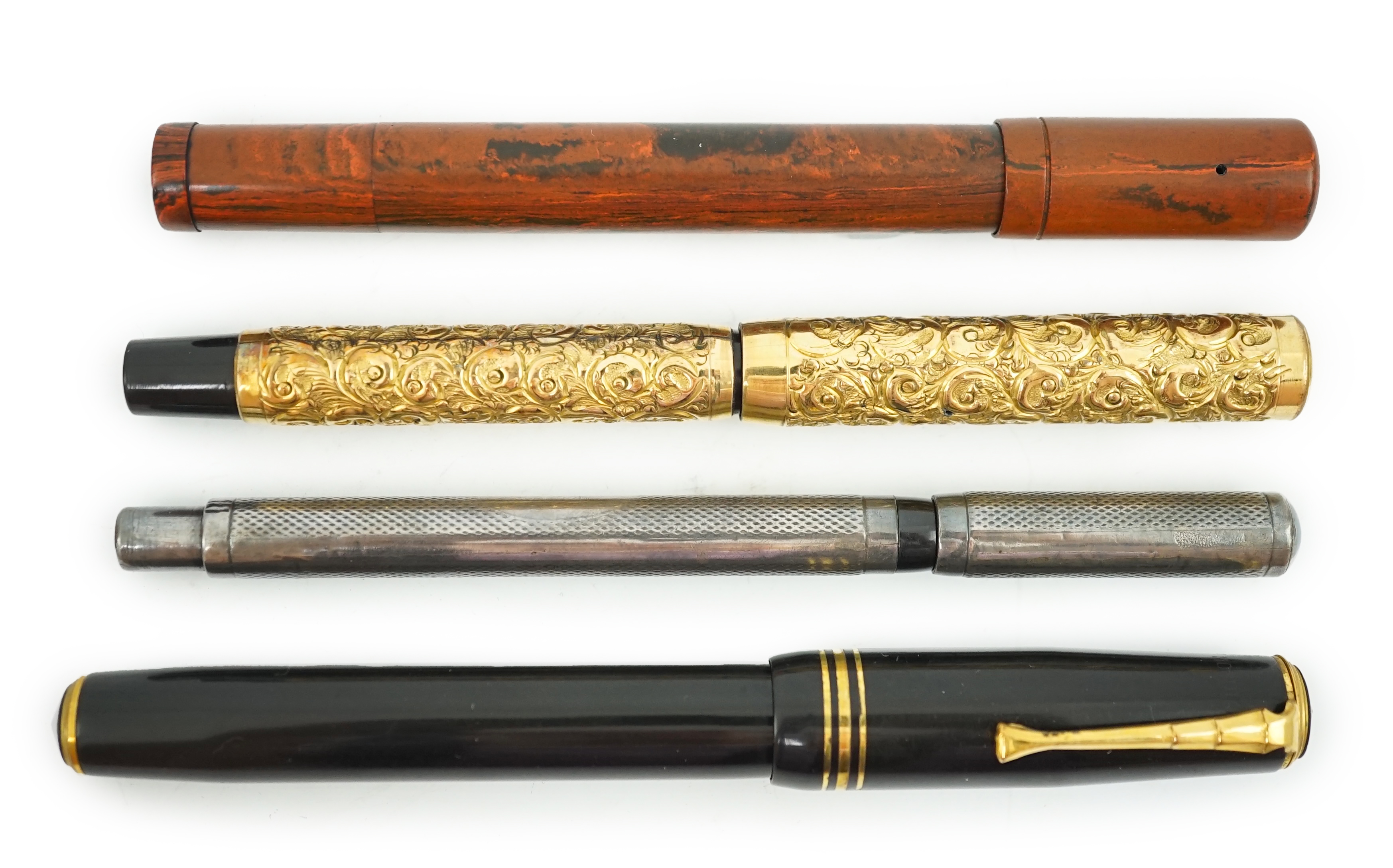 Four sundry fountain pens to include a silver hallmarked Eyedropper